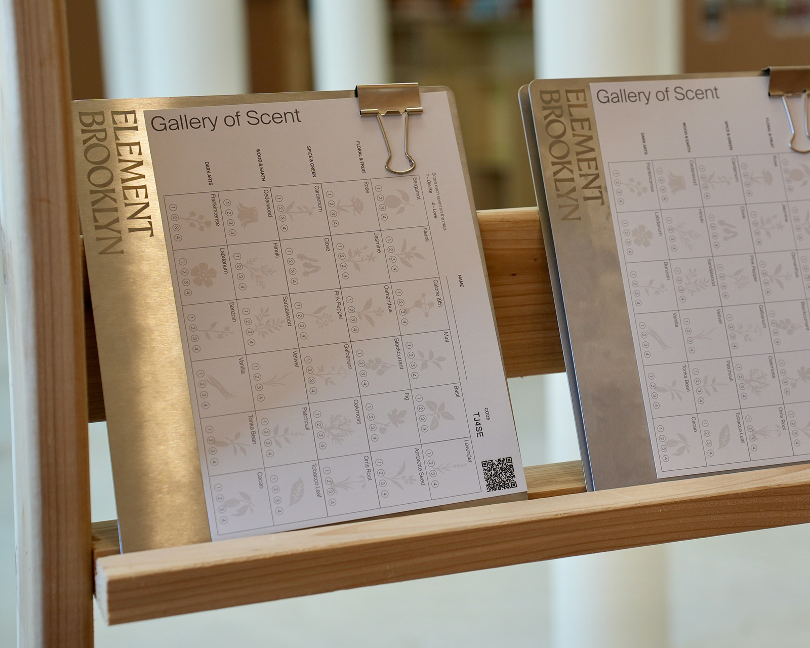 Gallery of Scent scorecards on clipboards, ready to rate the thirty notes